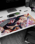 Silver-haired ruby-eyed swordswoman slashing katana on anime desk pad 40x20 inches at sunset.