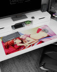 36x16 inches anime desk pad showing golden-eyed redhead lounging on a pink pillow with sparkly highlights.