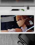 Anime girl mouse pad 32x16 inches in chestnut hair tones with neon-blue sparks on a moody dark backdrop.