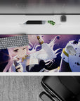 Pastel pink and purple night glow desk pad 36x16 inches with sparkly dust and action-debris vibe.