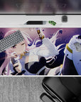 Pastel pink, purple night glow anime desk pad 40x20 inches with sparkly dust and action energy.