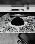 Monochrome anime desk pad 40x20 inches in stark black-and-white, brutal yet calming post-apocalyptic mood.