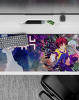 36x16 inches desk pad in neon purples and inky feather bursts, pastel blue-to-pink hair, cozy bright mood.