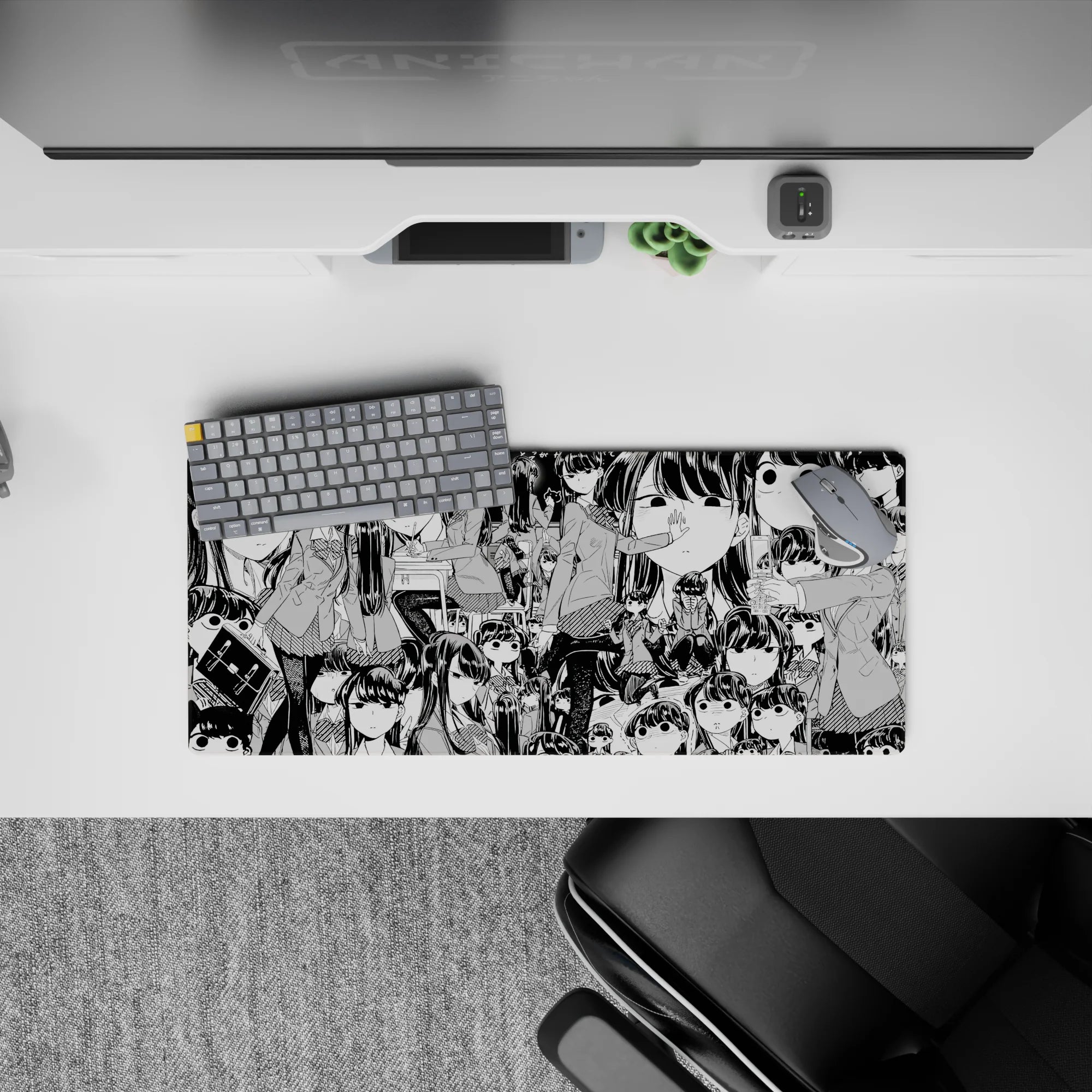 28x12 inches anime girl mouse pad in crisp black ink, cute chaotic vibe with wide eyes and tiny frowns.
