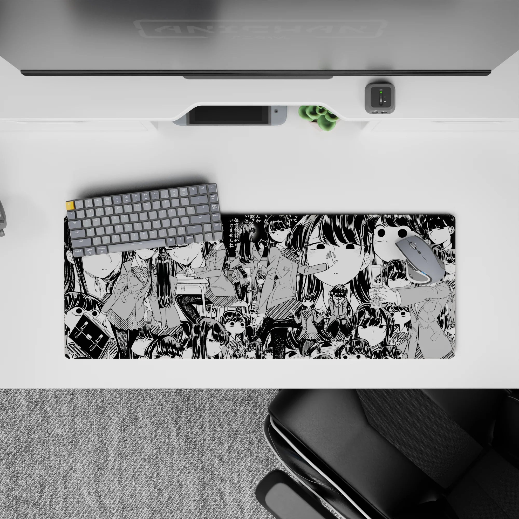 32x12 inches anime girl mouse pad in crisp black and white, chaotic-cute deadpan faces and bold ink linework.