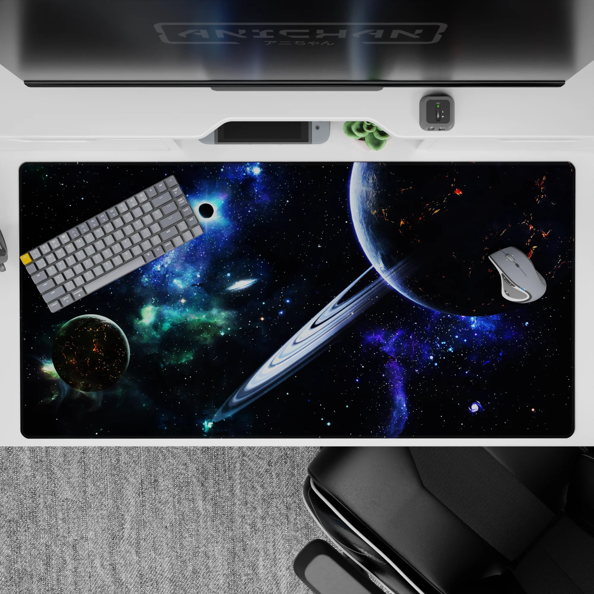 Dreamy neon-blue and deep black desk pad 40x20 inches with green nebula haze and sci-fi night vibe.