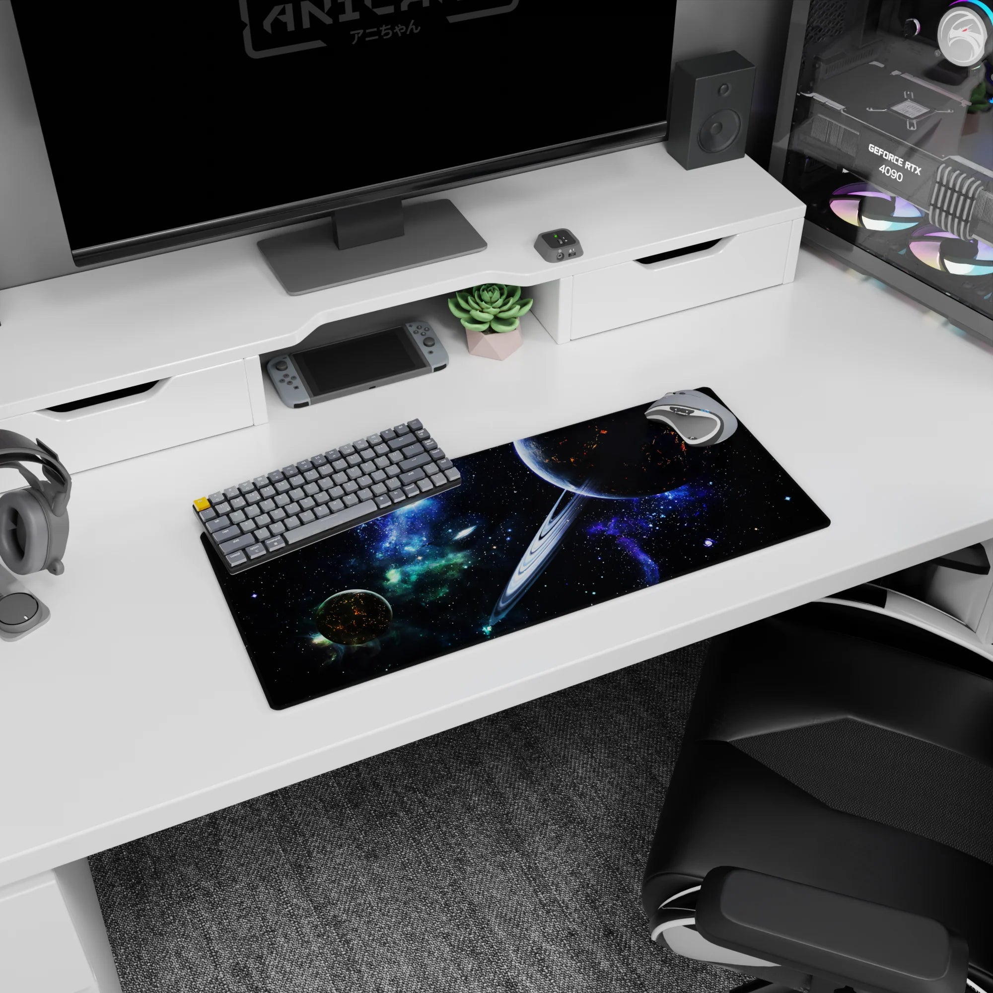 Giant ringed planet with ember-like cracks under a star-splashed sky, 28x12 inches desk mouse pad.