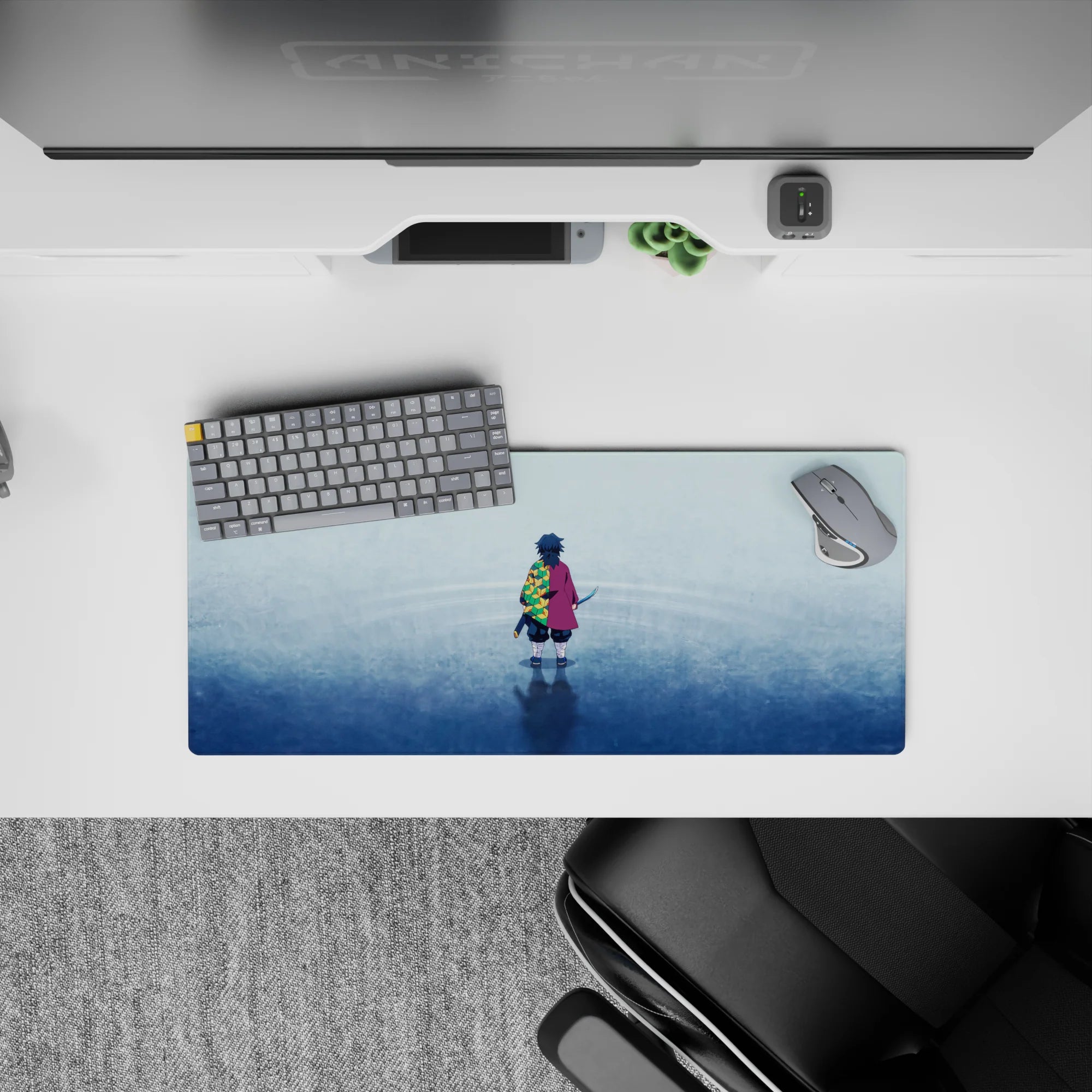Mouse pad featuring Giyu Tomioka from Demon Slayer, 28x12 inches, with a minimalist design and hexagonal green-yellow pattern.