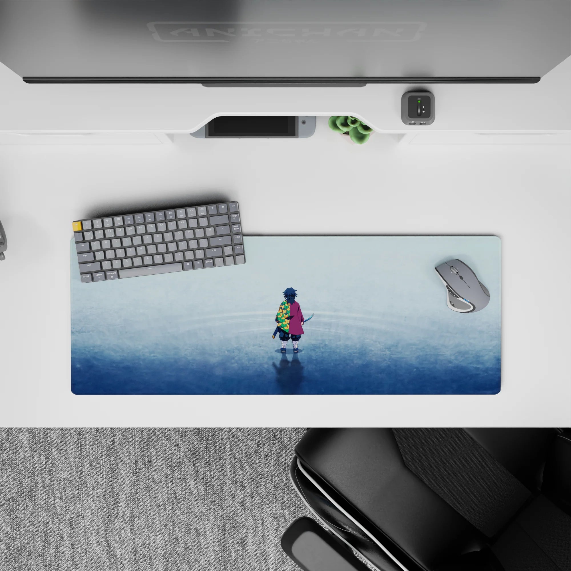 Giyu Tomioka from Demon Slayer on a 32x12 inch mouse pad, featuring his crimson cloak and hexagonal green-yellow pattern.