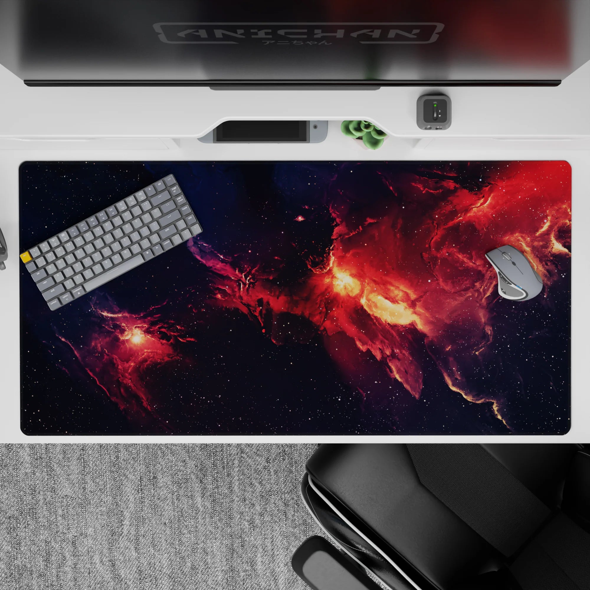 Navy-to-ember desk pad 40x20 inches with glowing orange clouds and cozy dramatic space mood.