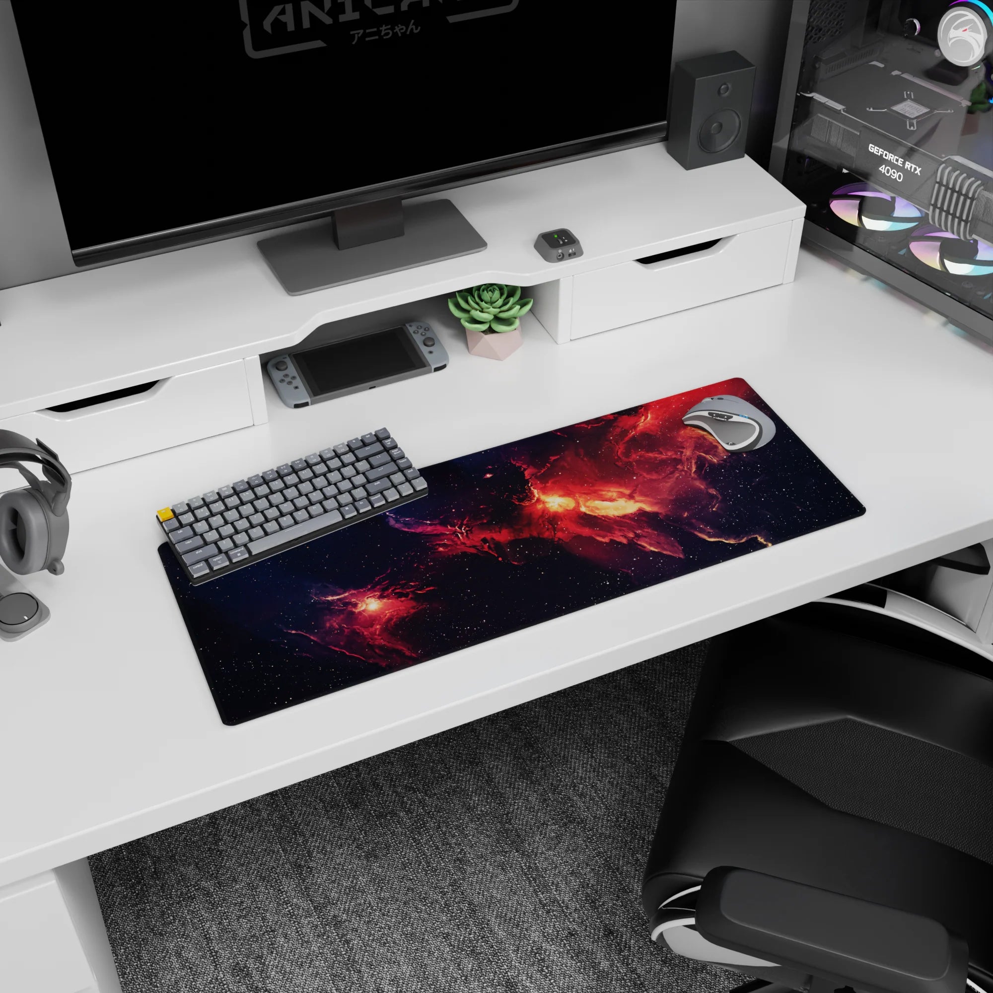 Fiery nebula clouds and tiny star speckles scene on a 32x12 inches extended mouse pad for desk setups.