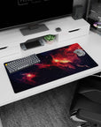 Fiery nebula stretching across a star-speckled space scene mouse pad, 32x16 inches.