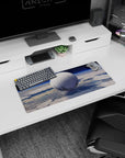 Giant moon-like planet hovering in blue space mouse pad, 28x12 inches, quiet orbit scene for desks.