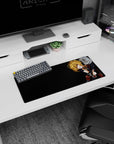 28x12 inches Tanya Degurechaff mouse pad, mischievous grin and crisp military insignia under monitor glow.