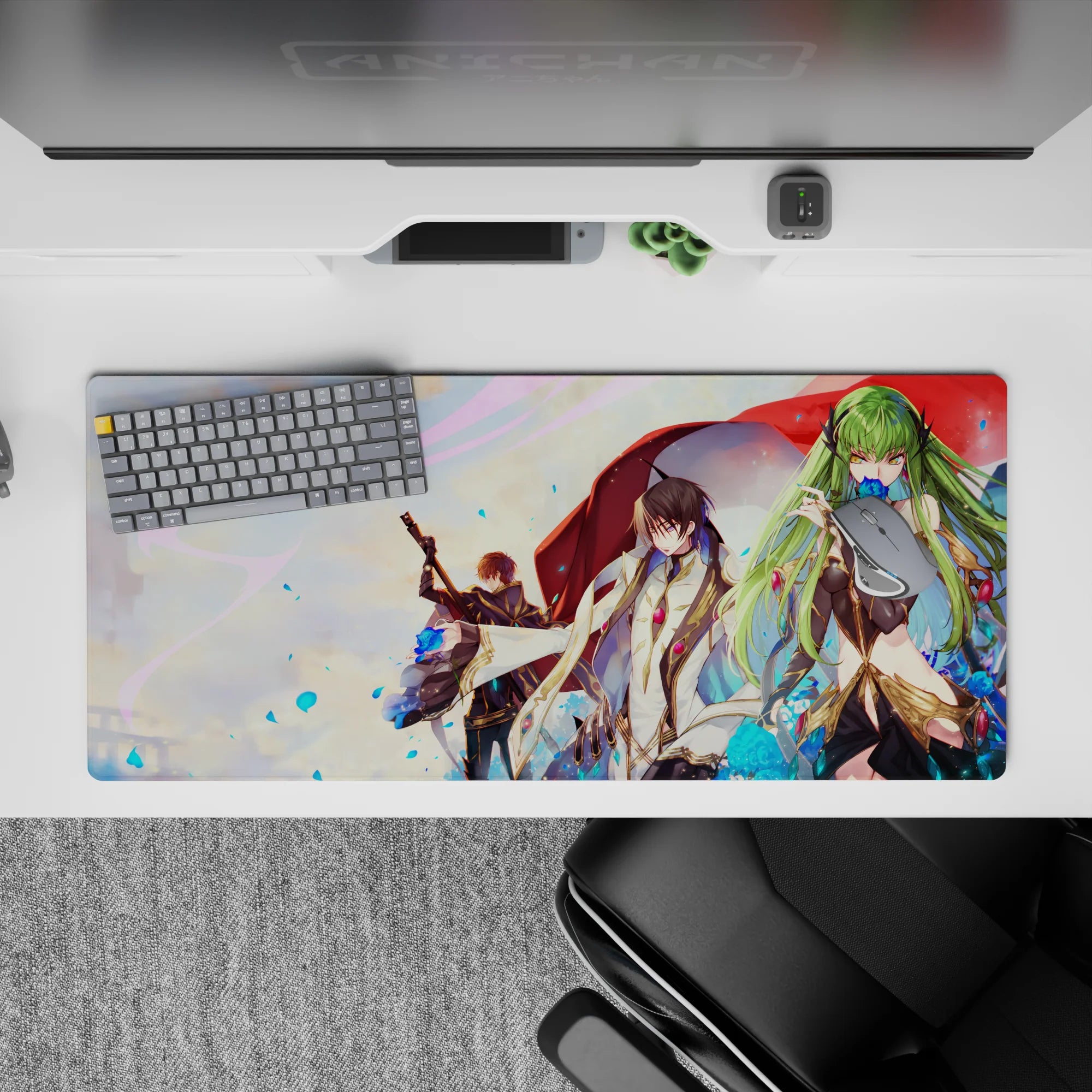 36x16 inches anime desk pad in sunset pastels with red cloak, blue sparks, and luxe black-gold details.
