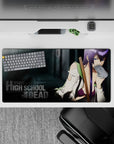Edgy purple and smoky grey anime girl desk mat with torn shirt detail, 32x16 inches.
