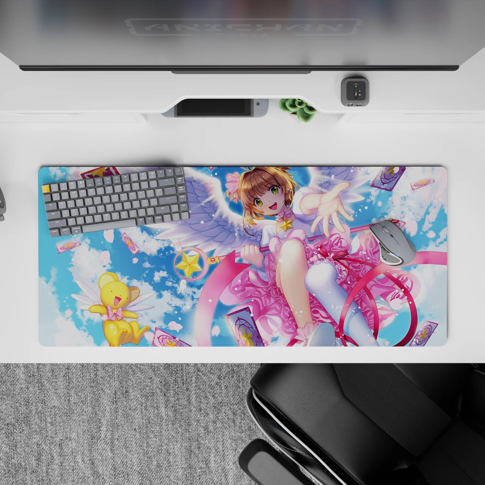 36x16 inches kawaii desk pad in sky blue and candy pink, springy Cardcaptor vibes with cute sparkle.