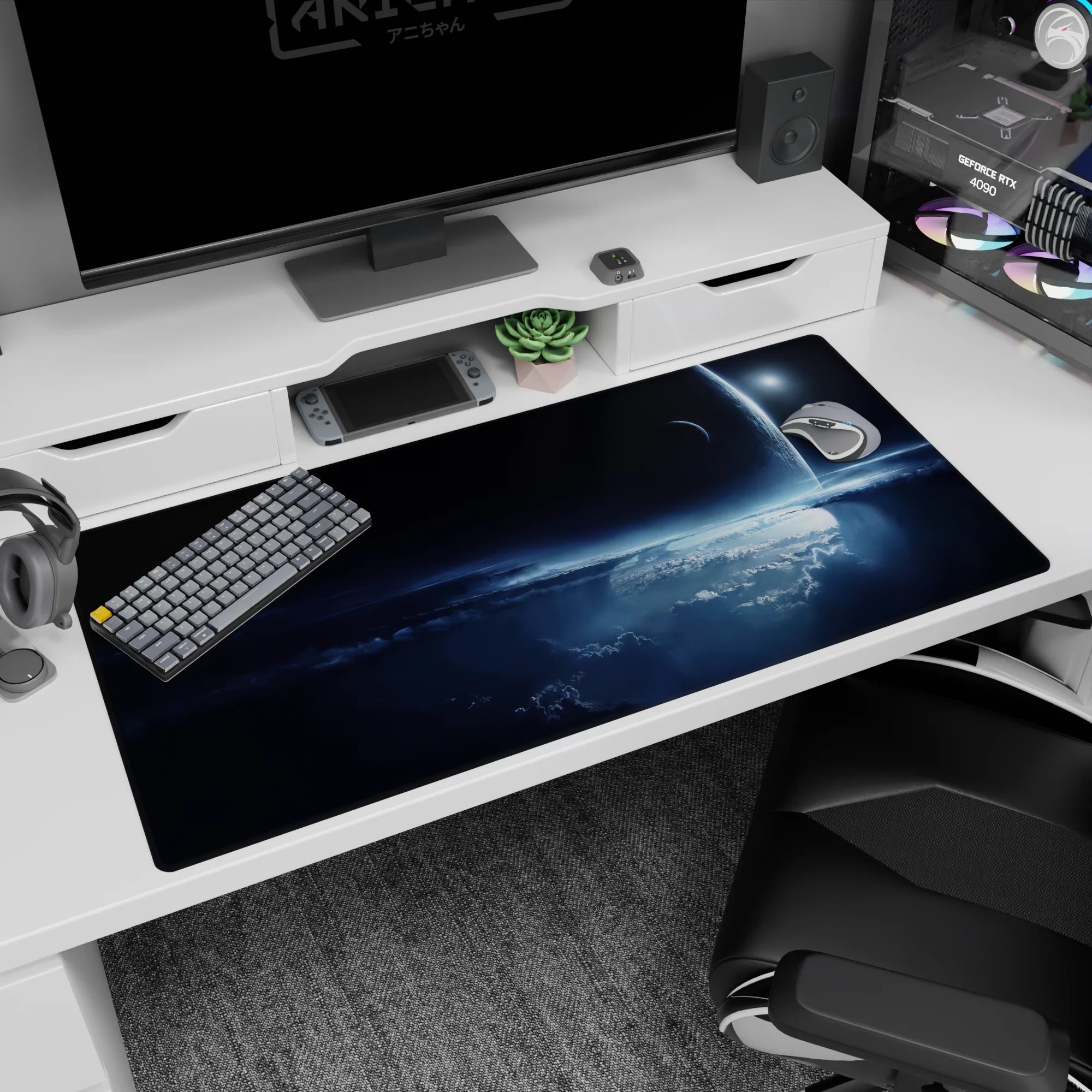 Glowing planet curve scene desk pad 40x20 inches set against a dark starry galaxy backdrop.