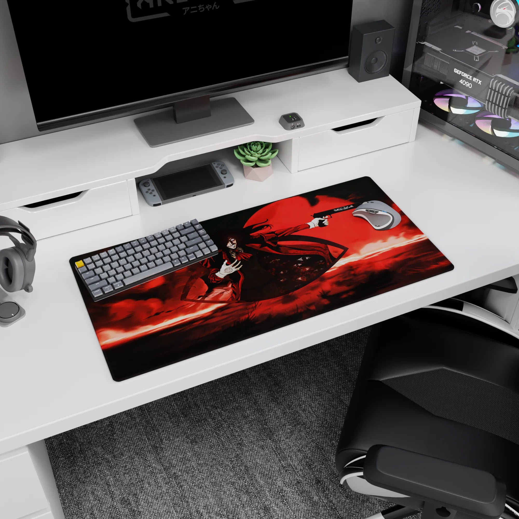 32x16 inches Alucard anime desk mat, coat flaring, gloved hand on chest, aiming a long pistol at you.