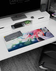 32x12 inches anime girl mouse pad showing shy pink-haired girl up close, big ribbons, bokeh lights behind.