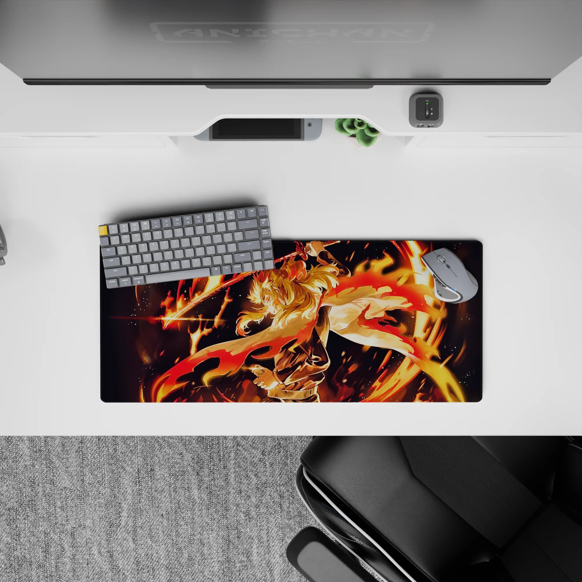 Rengoku from Demon Slayer anime mouse pad, 28x12 inches, featuring fiery design with orange, red, and gold hues.