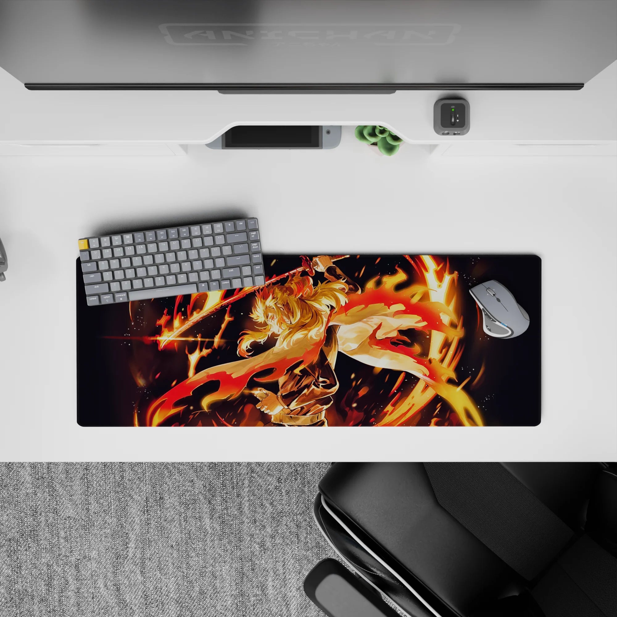 Anime mouse pad featuring Rengoku from Demon Slayer, 32x12 inches. Vibrant flames and dynamic action capture heroic energy.