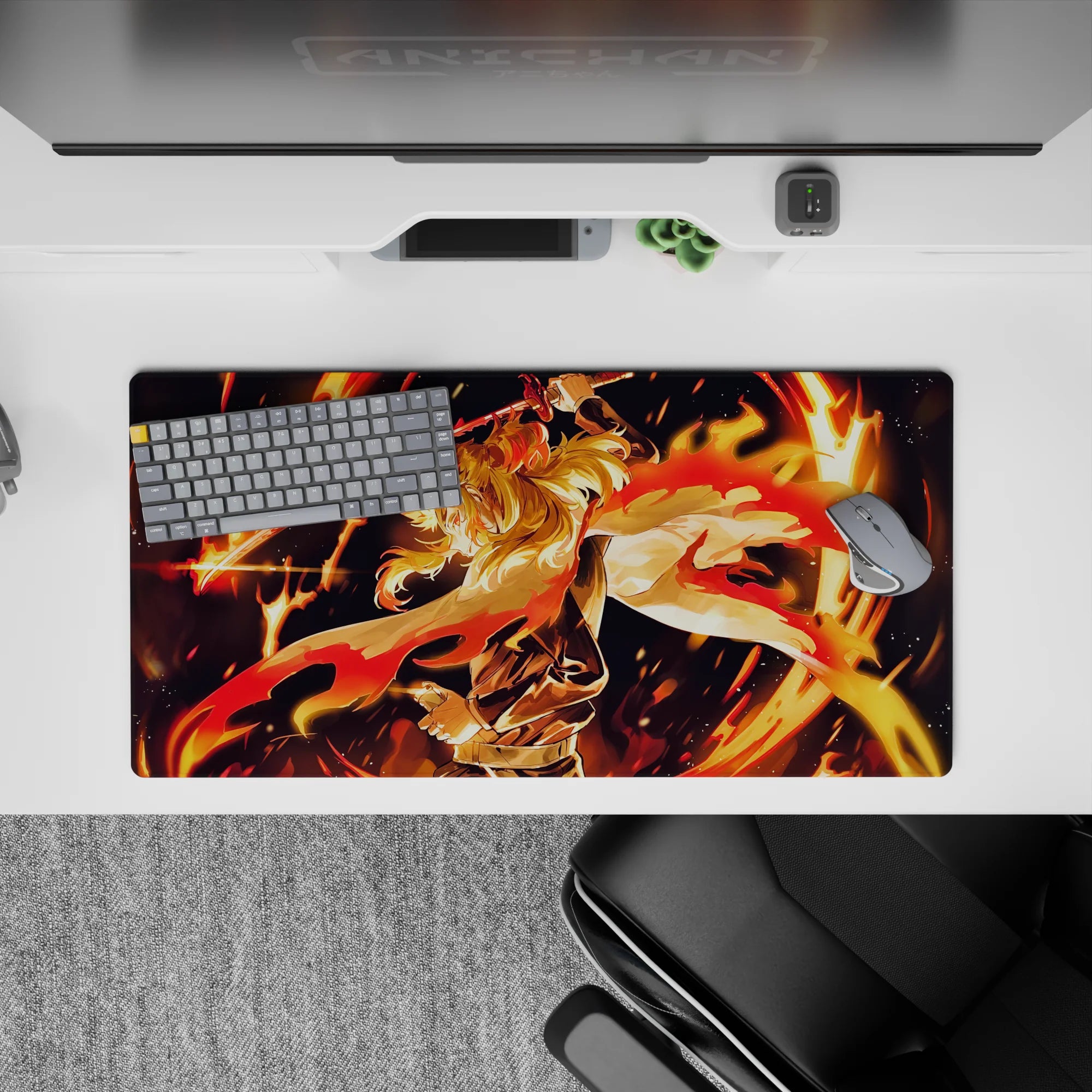 Anime mouse pad 32x16 inches featuring Rengoku from Demon Slayer, showcasing his fiery aura and dynamic stance.