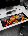 Rengoku Demon Slayer desk pad 36x16 inches featuring fiery design with Rengoku's golden hair and blazing sword.