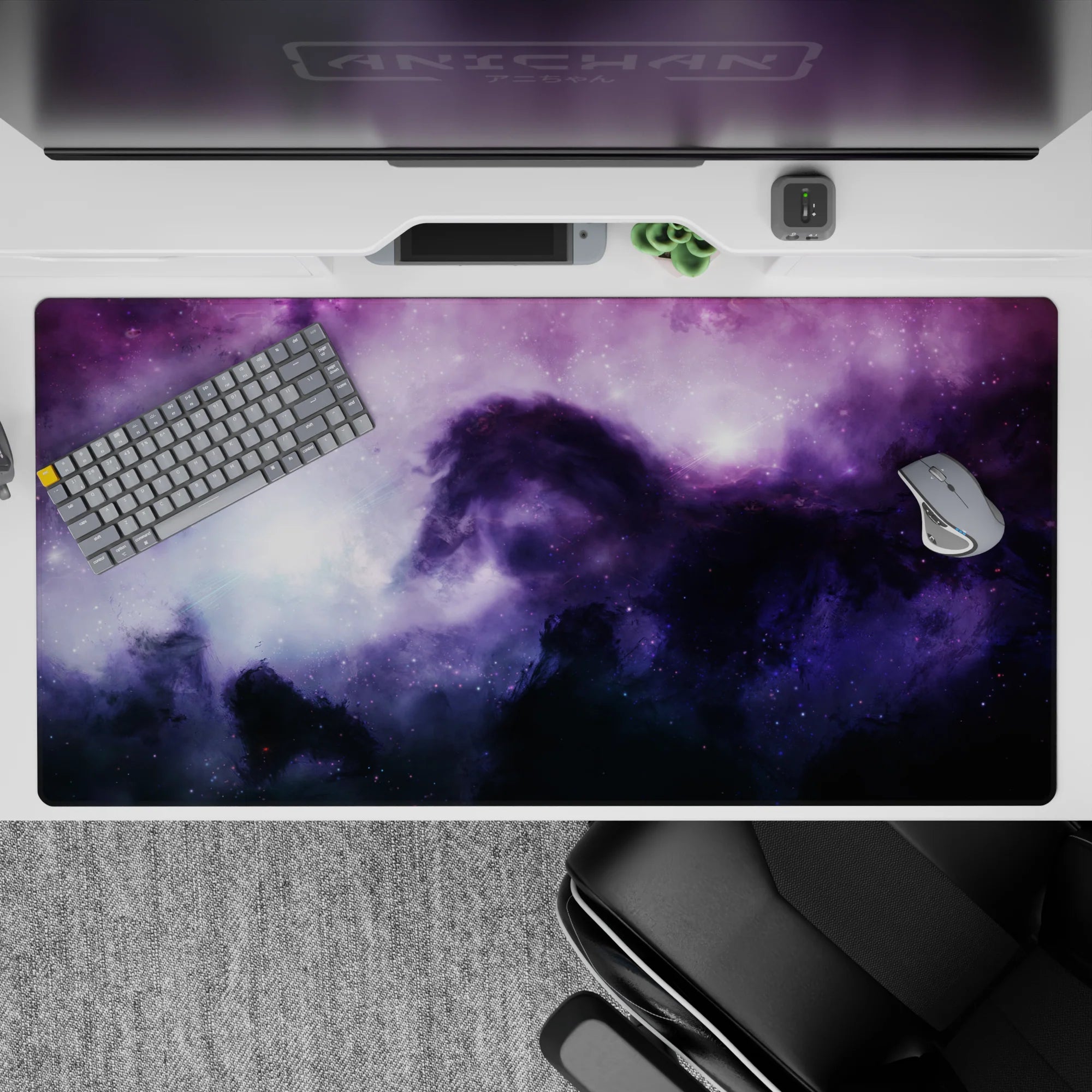 Calm magical purple-to-inky-blue galaxy desk pad with misty light blooms, 40x20 inches.