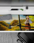 36x16 inches anime mouse pad in warm golds and leafy greens, cozy adventure mood with soft sky gradients.