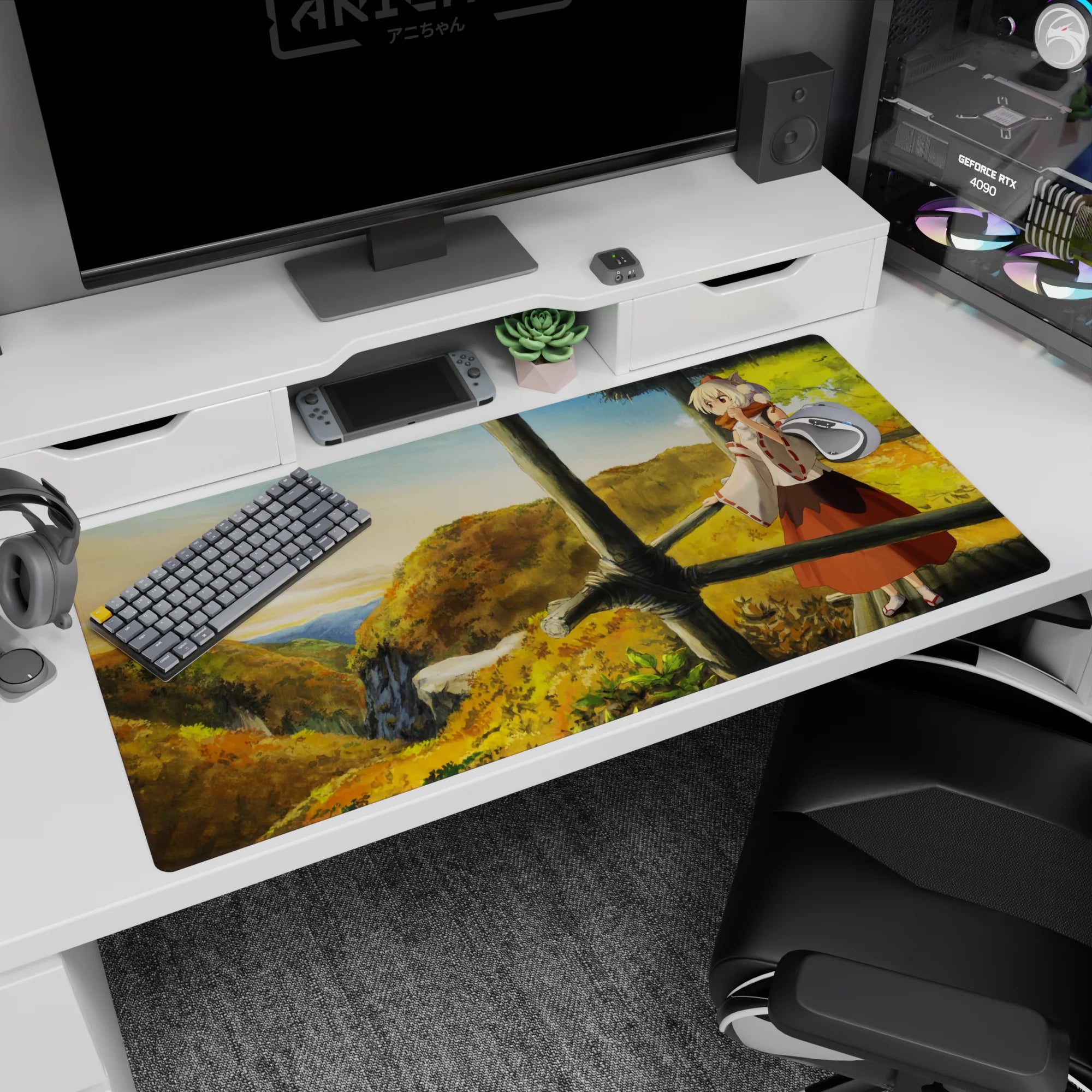 Fox-eared anime girl desk pad 40x20 inches, scarf up, watching a misty valley over autumn hills.