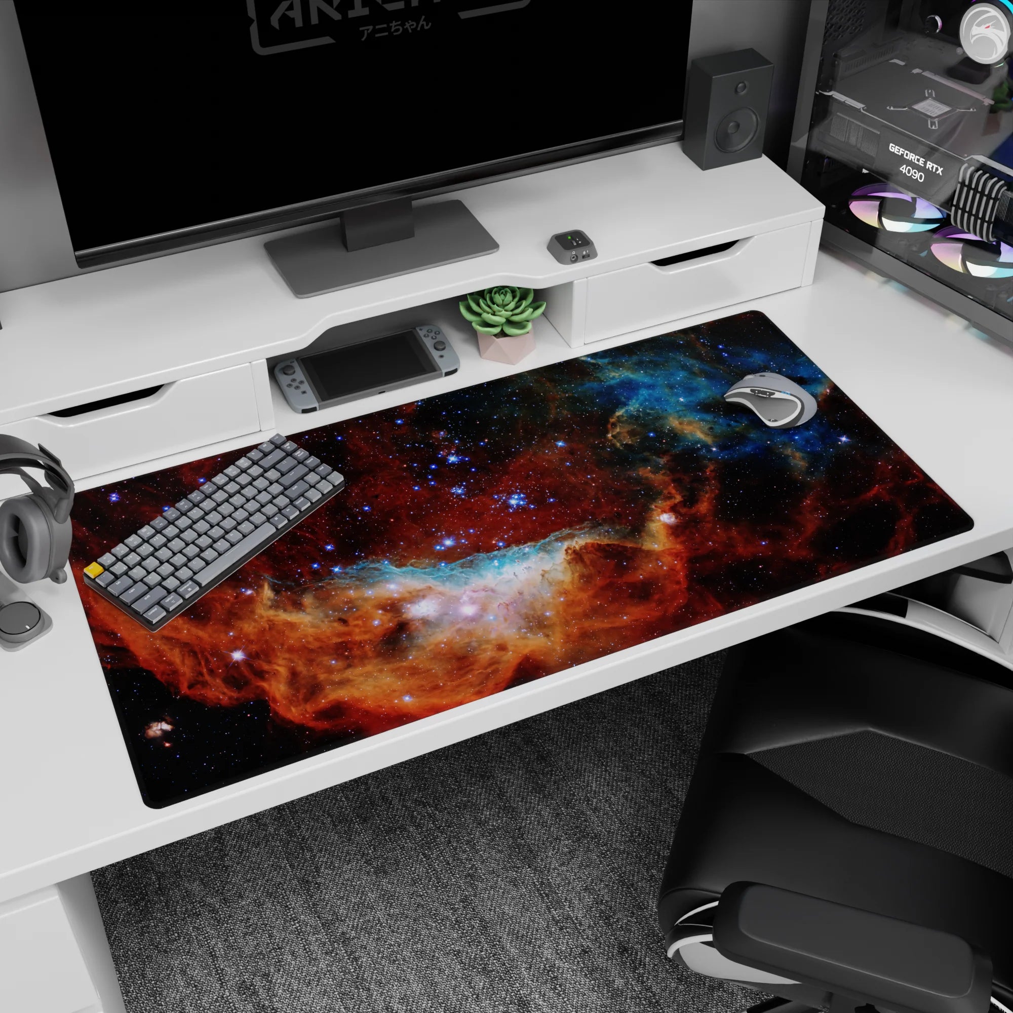 Star-filled galaxy scene desk pad 40x20 inches with a bright nebula vortex and drifting blue cloud.