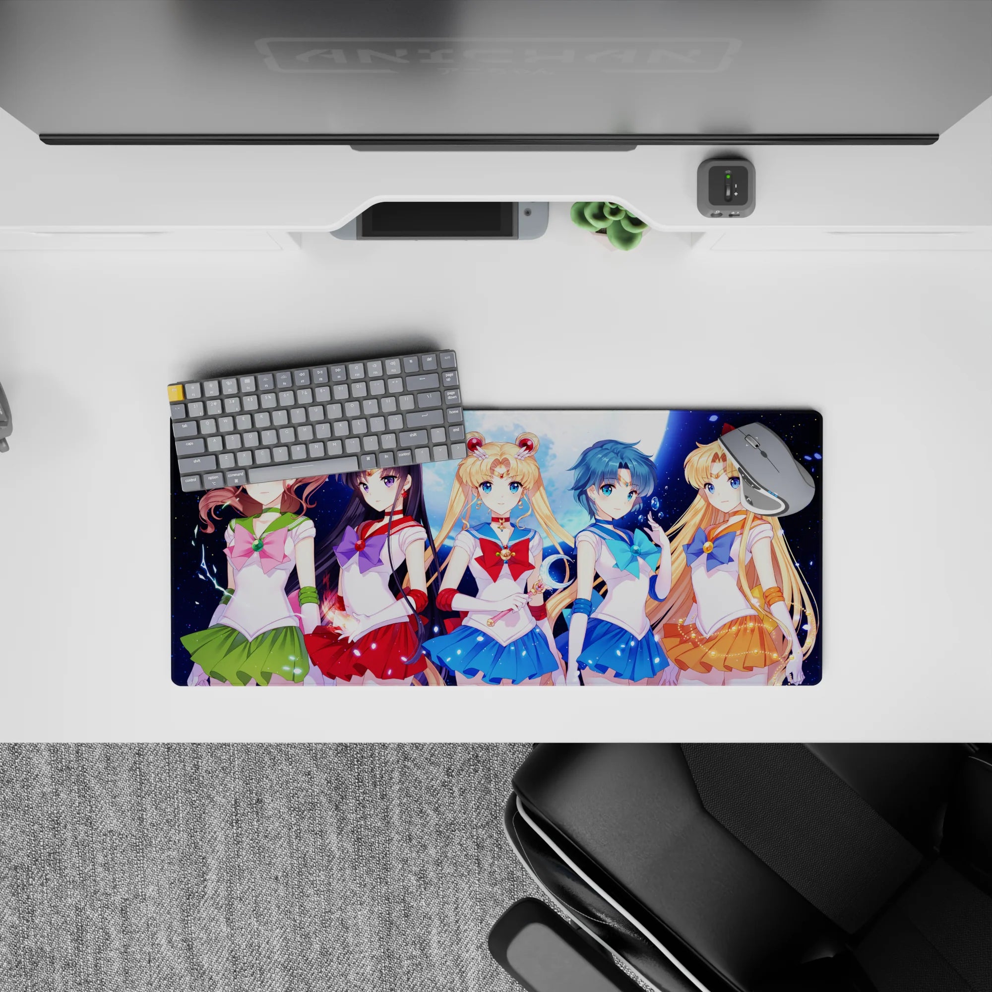 28x12 inches anime girl mouse pad in emerald, crimson, ocean blue, and sunny orange with spark effects.