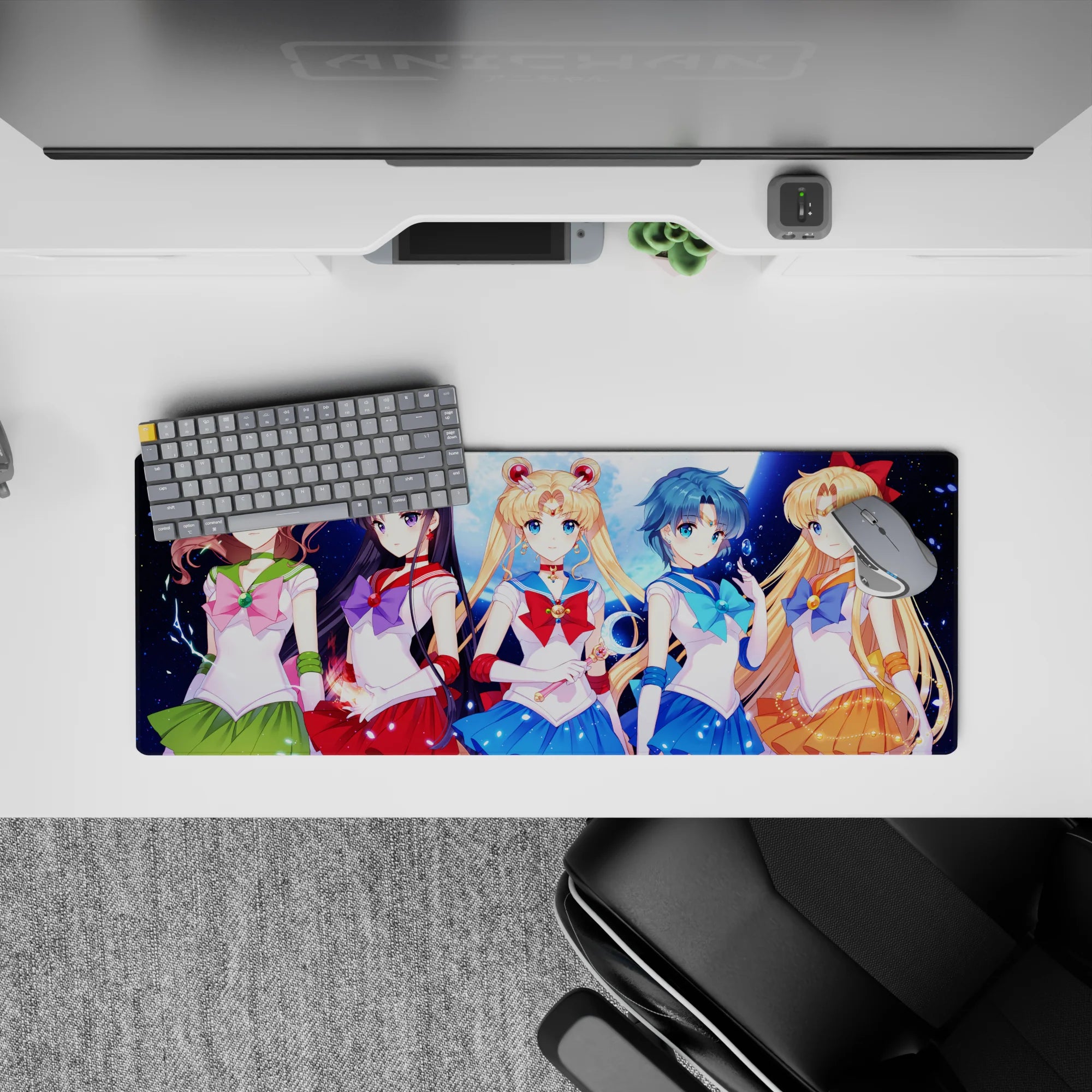 32x12 inches anime girl mouse pad in emerald, crimson, ocean blue, and sunny orange with spark effects.