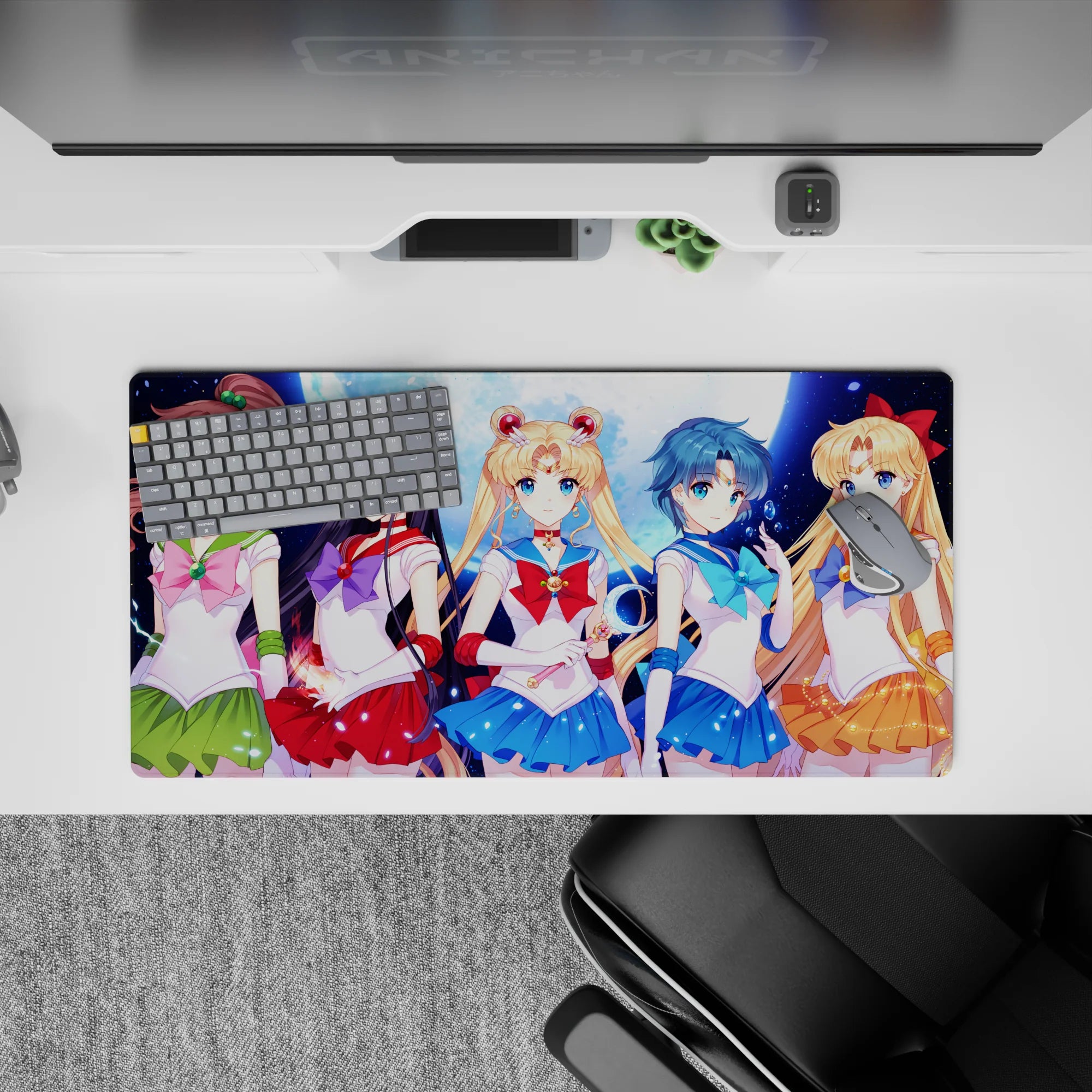 32x16 inches anime girl mouse pad in emerald, crimson, ocean blue, and orange with bright spark effects.