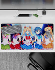 32x16 inches anime girl mouse pad in emerald, crimson, ocean blue, and orange with bright spark effects.