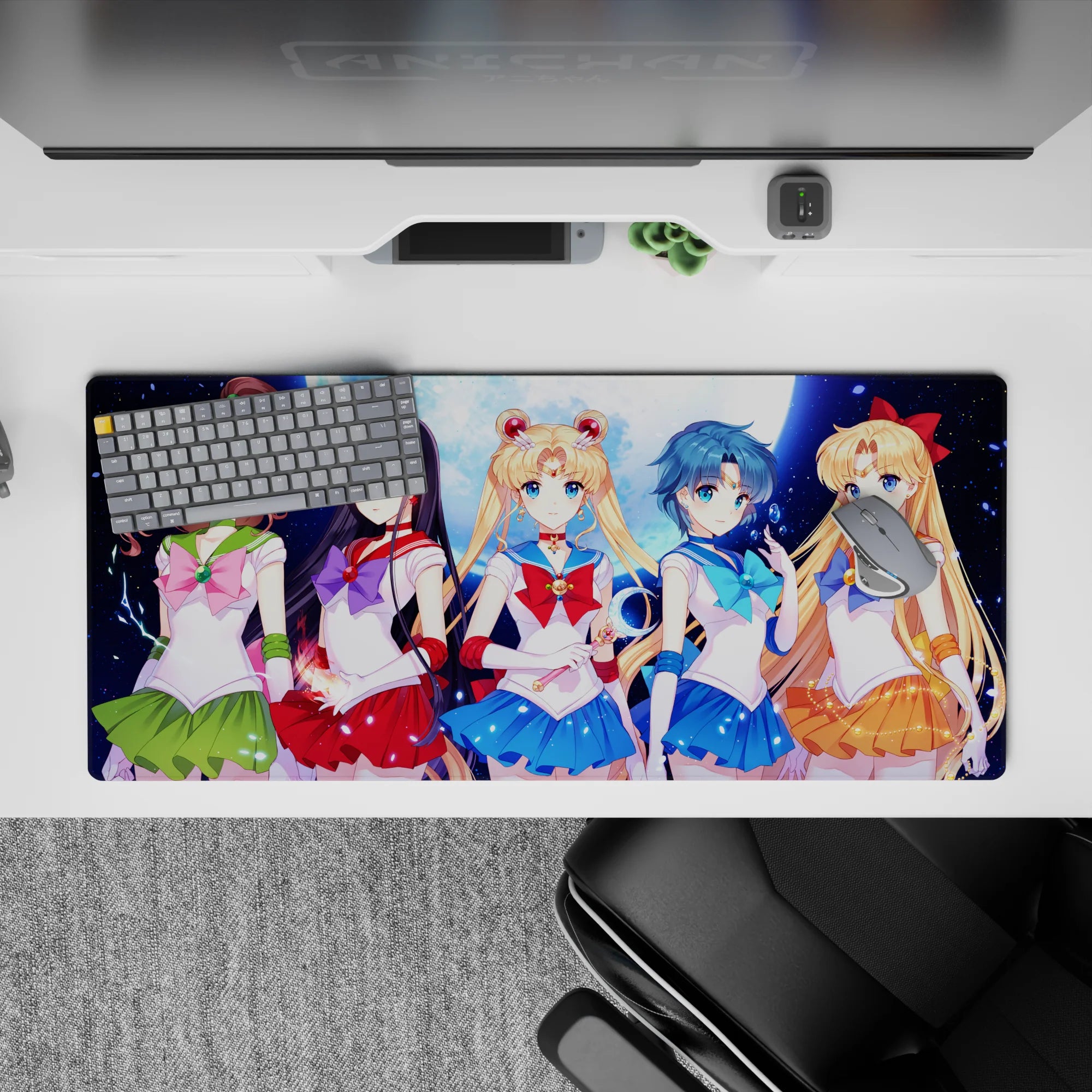 Starry moonlit anime girl desk pad 36x16 inches in emerald, crimson, blue, and orange.