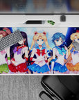 40x20 inches anime girl desk pad in emerald, crimson, ocean blue, and orange with bright nostalgic vibes.