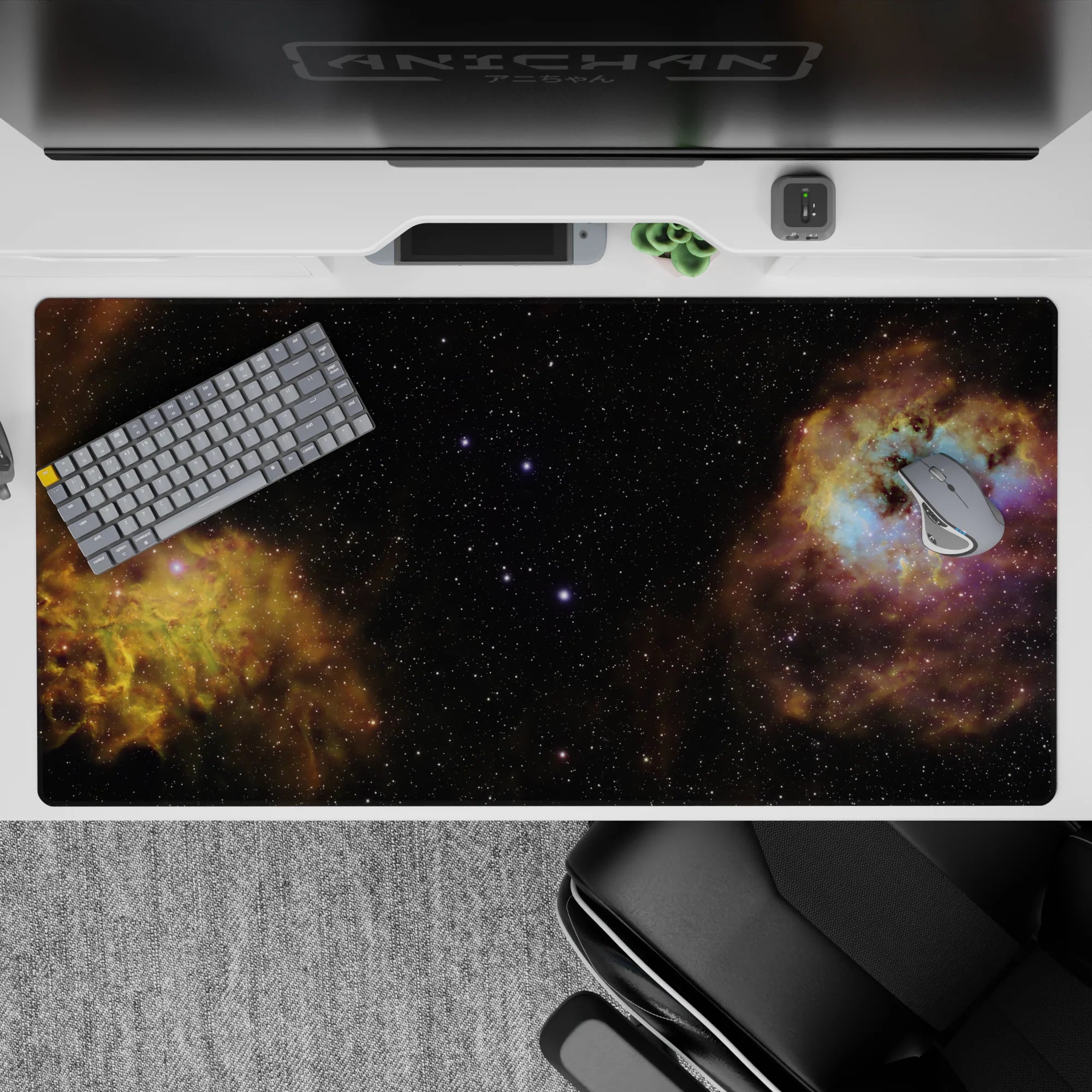 Dark galaxy desk pad 40x20 inches in rich black with smoky gold swirls and icy blue accents.