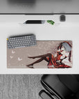 28x12 inches mouse pad in moody ruby red and black on pale background, cozy late-night desk vibe.