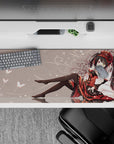 36x16 inches desk pad in ruby red and black on a pale background, cozy dark gothic-lolita mood.