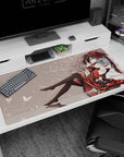 Dark-haired anime girl lounging in ruby dress on desk pad 40x20 inches with glossy thigh-highs.