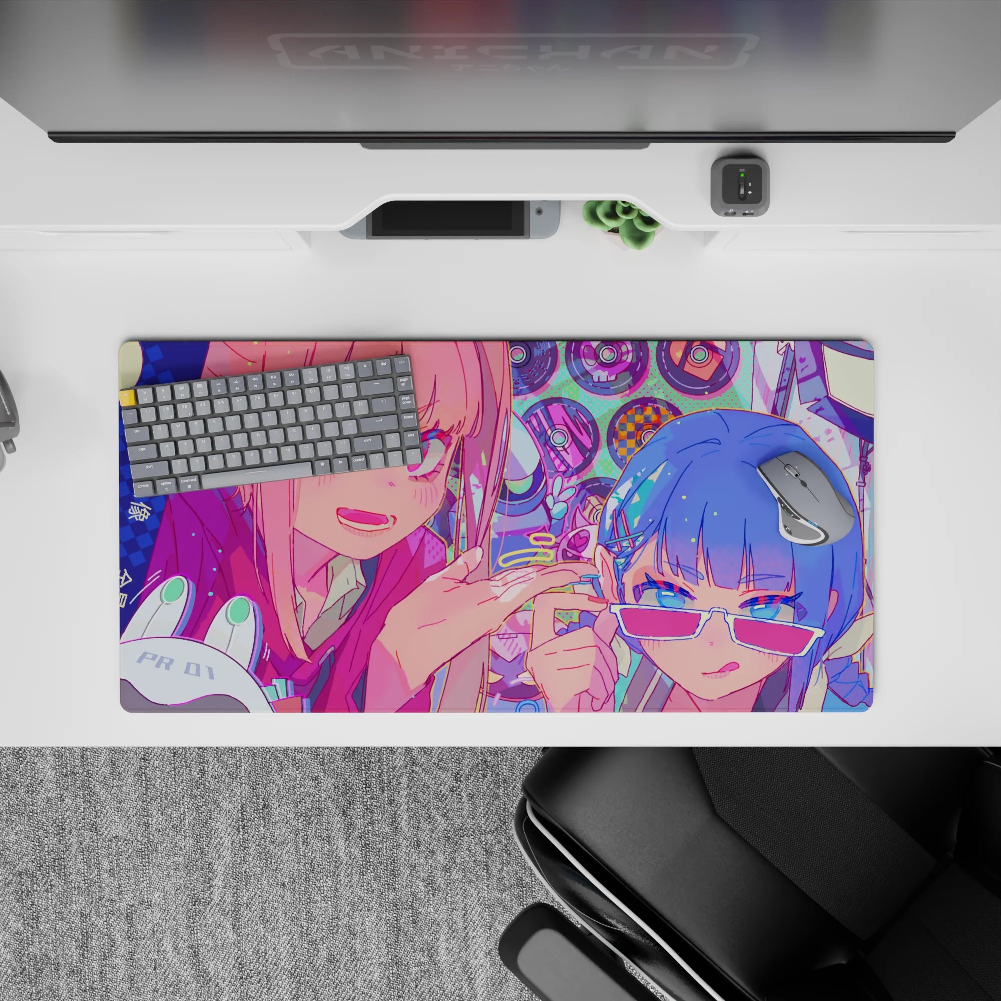 32x16 inches anime mouse pad in hot pink, icy blue, mint dots; loud candy chaos best-friend vibe.