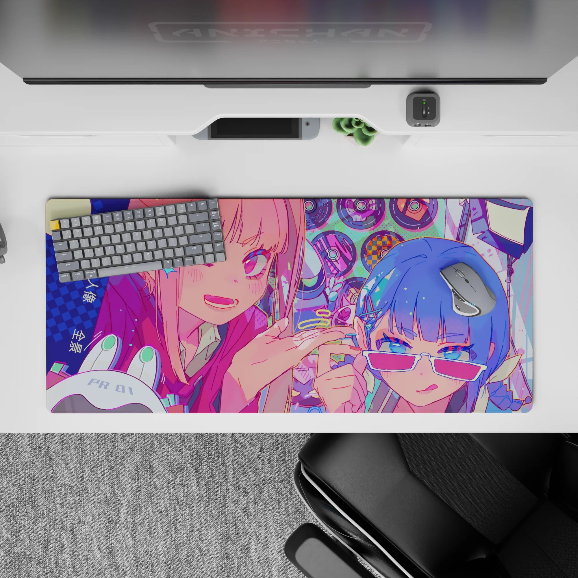 36x16 inches neon pink, icy blue, and mint dot anime desk pad with playful candy-chaos vibe.