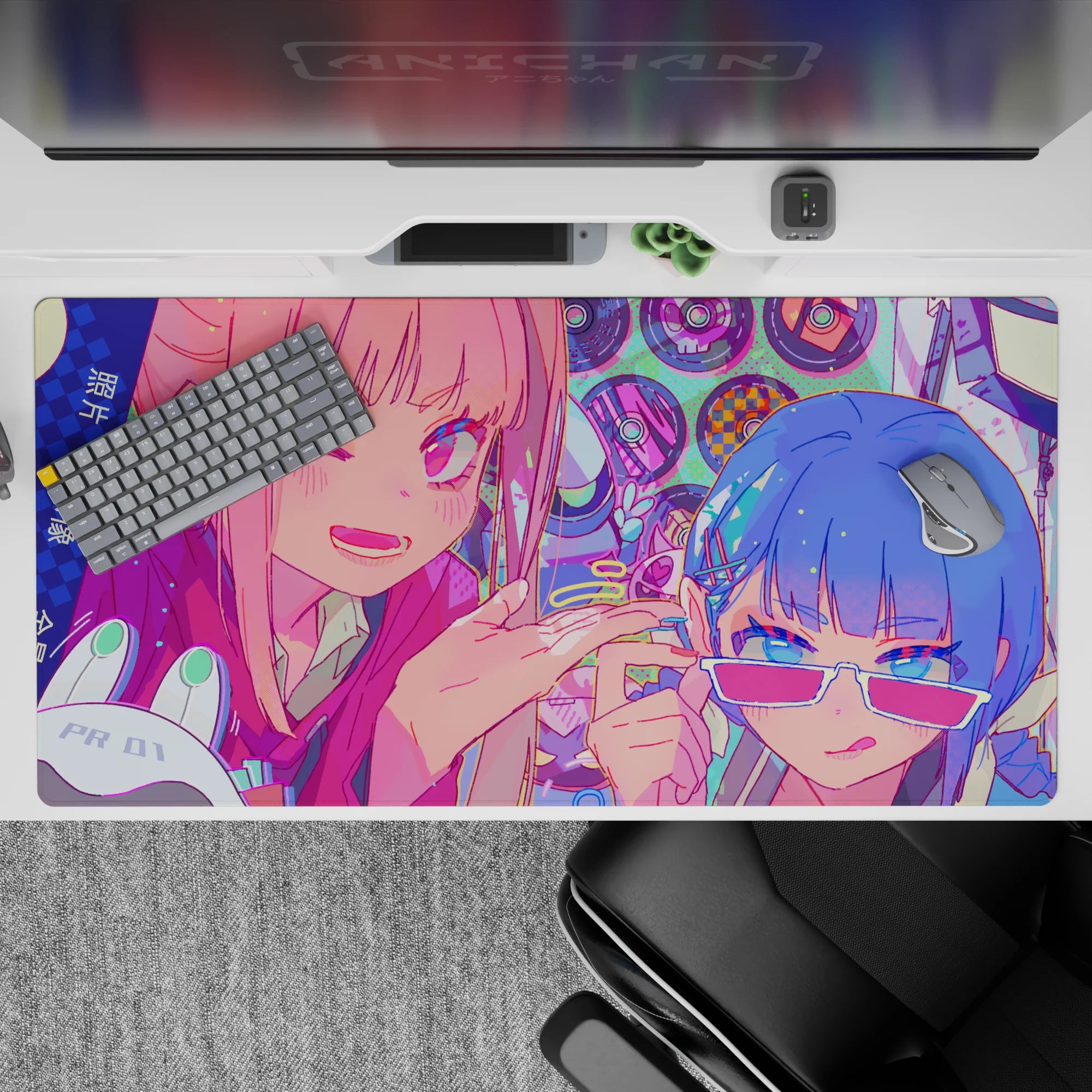 Hot pink, icy blue, and mint dot anime girl desk pad 40x20 inches with playful neon candy chaos vibe.