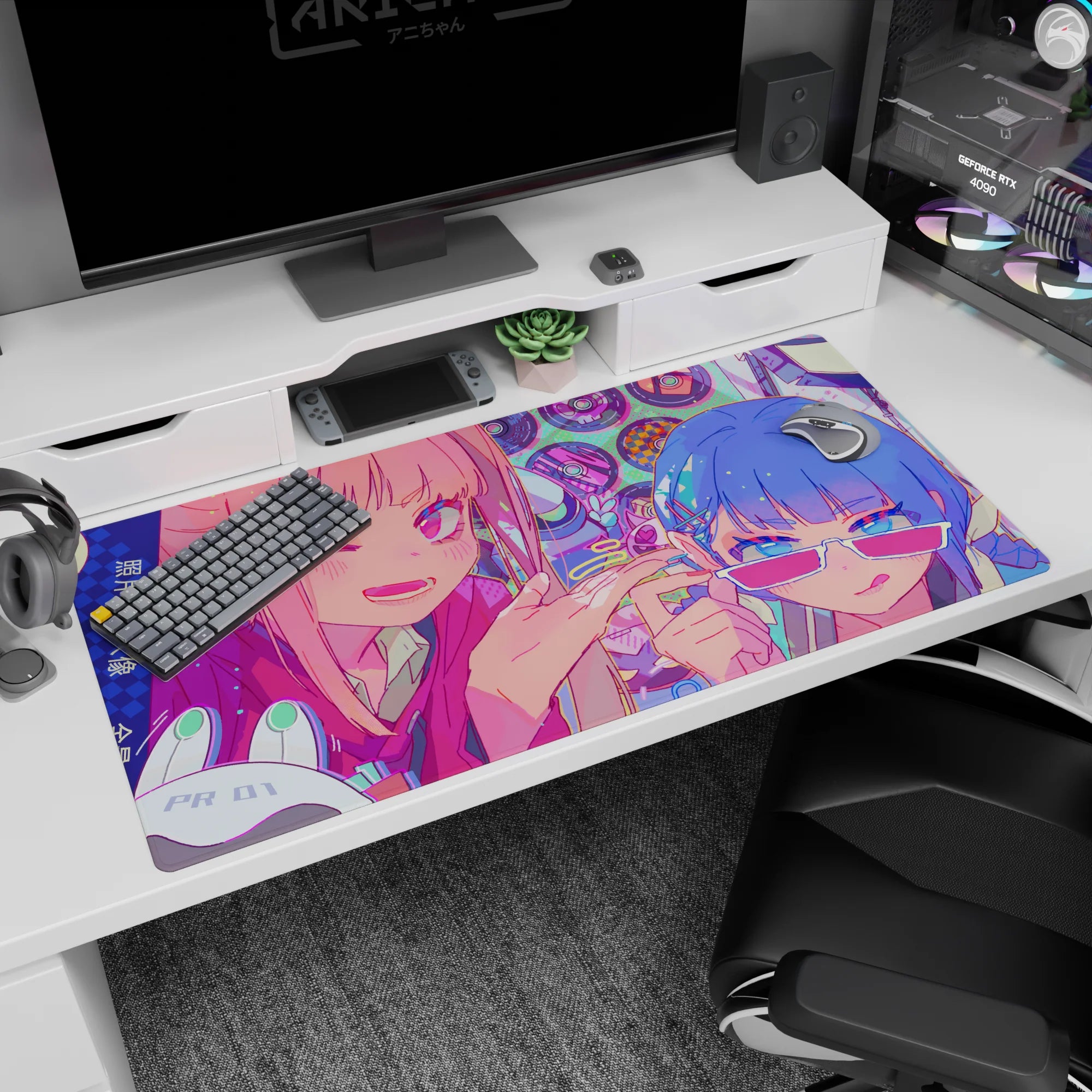 Winking pink-haired anime girl and blue-haired friend in sunglasses on desk pad 40x20 inches.