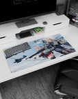 Anime girl mouse pad 32x16 inches showing silver-haired and blonde rivals smirking mid-mission in the sky.