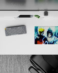 Naruto and Sasuke back to back under moonlit sky on 14x10 inch anime mouse pad, capturing tension and history.