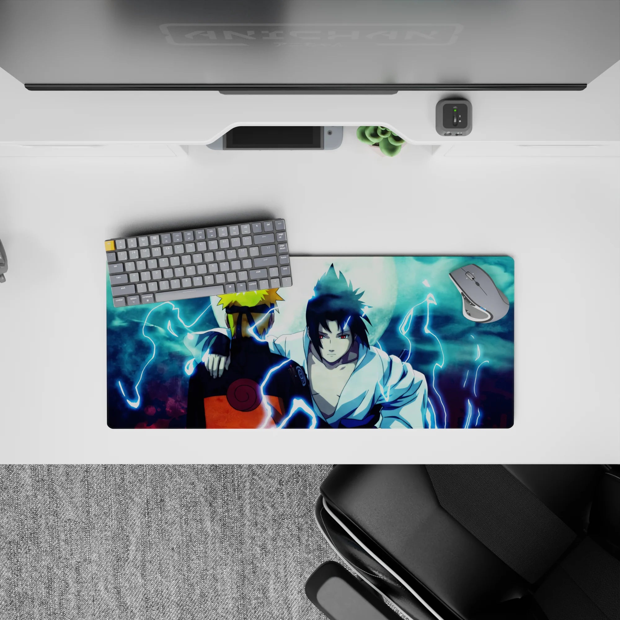 Mouse pad 28x12 inches featuring Naruto and Sasuke back to back under a moonlit sky, capturing a pivotal anime moment.
