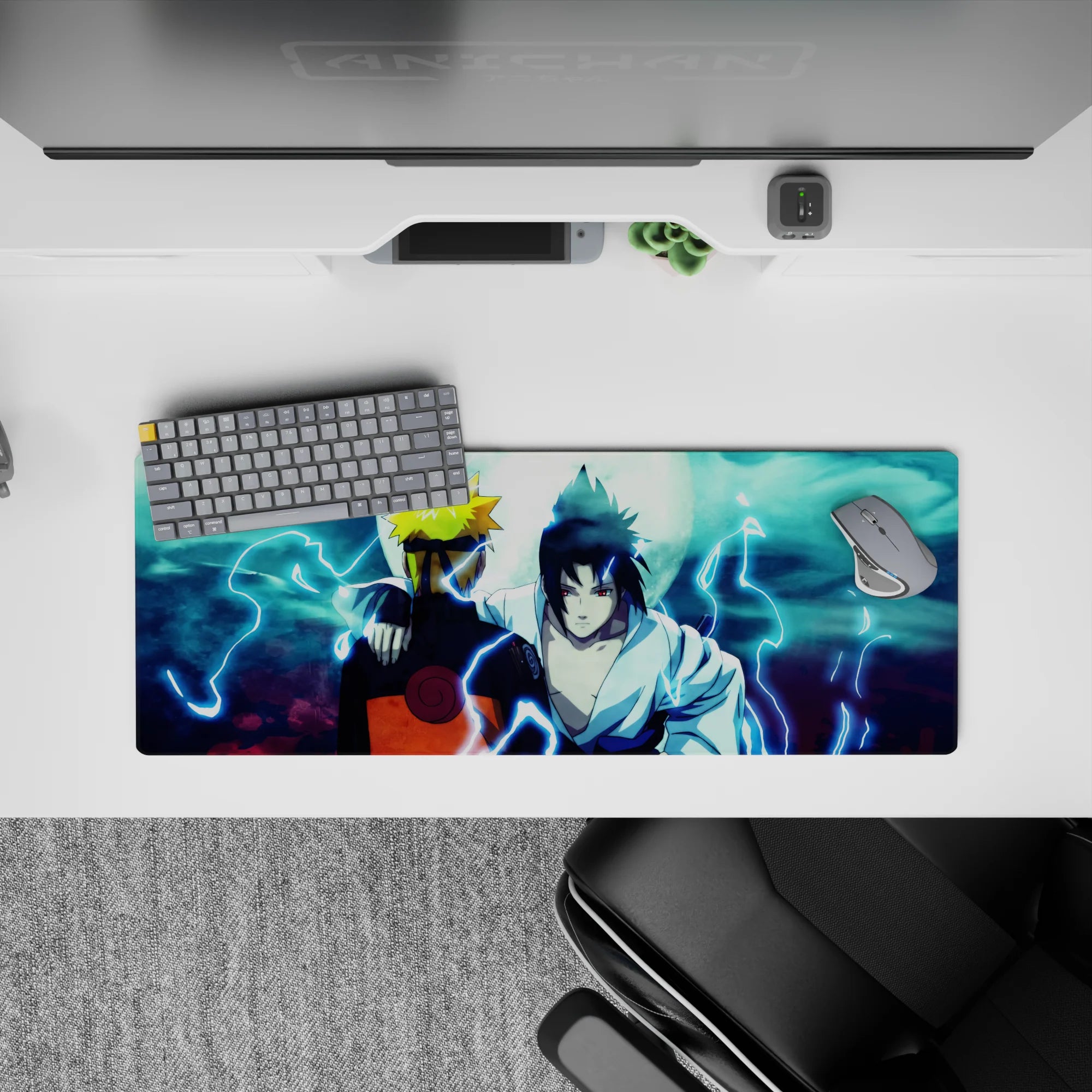 Naruto and Sasuke on 32x12 inch anime mouse pad, back to back under moonlit sky, electric blues, intense scene.